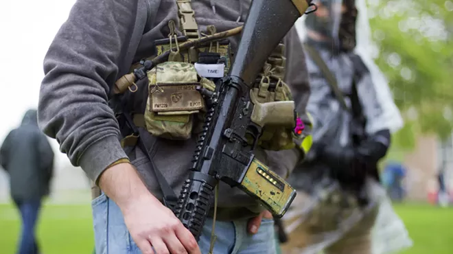 Armed protesters rallied against Gov. Gretchen Whitmer's coronavirus restrictions in May.