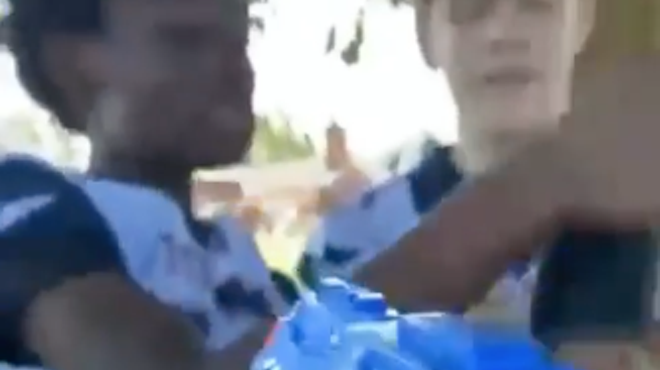 White students point water guns at a Black classmate in a video posted on Instagram and TikTok.