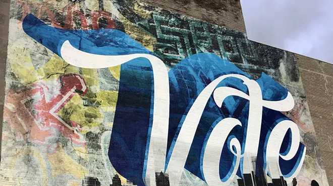 Mural in New Center in Detroit encourages people to vote.