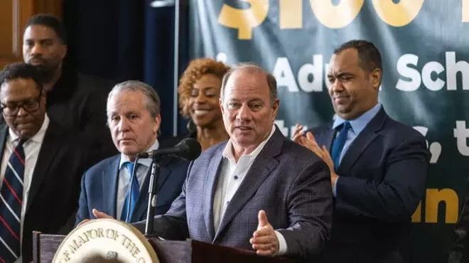 Mayor Mike Duggan discusses the Jump Start program at a news conference on Friday.