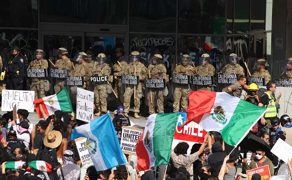 The National Guard patrols a federal building during the ICE protest in Downtown Los Angeles in June, 2025.