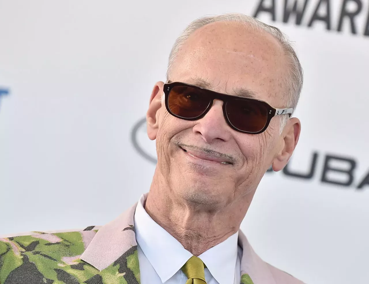 John Waters, 2015 After seeing a Waters solo art show in L.A., we became obsessed with getting his contemporary art in the show. His sense of humor comes through work that is clever, biting, and often dirty. In addition to having him be the special guest artist, we were also able to book his stage show by starting Dirty a day earlier to merge the exhibition with his one-man show, This Filthy World: Filthier and Dirtier. Waters stayed after his show giving VIP access to the entire crowd by taking countless selfies and signing hundreds of books.