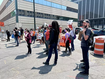 Protesters rallied in downtown Detroit after migrants were detained at the Patrick V. McNamara Federal Building.
