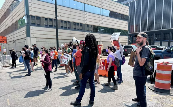 Protesters rallied in downtown Detroit after migrants were detained at the Patrick V. McNamara Federal Building.