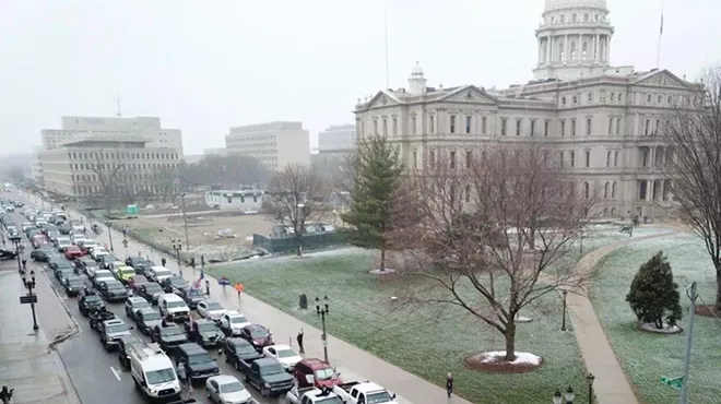 Image: People protest Whitmer's stay-at-home order by creating traffic gridlock, not adhering to social distancing