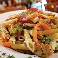 Pollo Pepperonata: Chicken strips, tri-colored peppers, red onions, olive oil and garlic served with penne pasta. - MT PHOTO: ROB WIDDIS