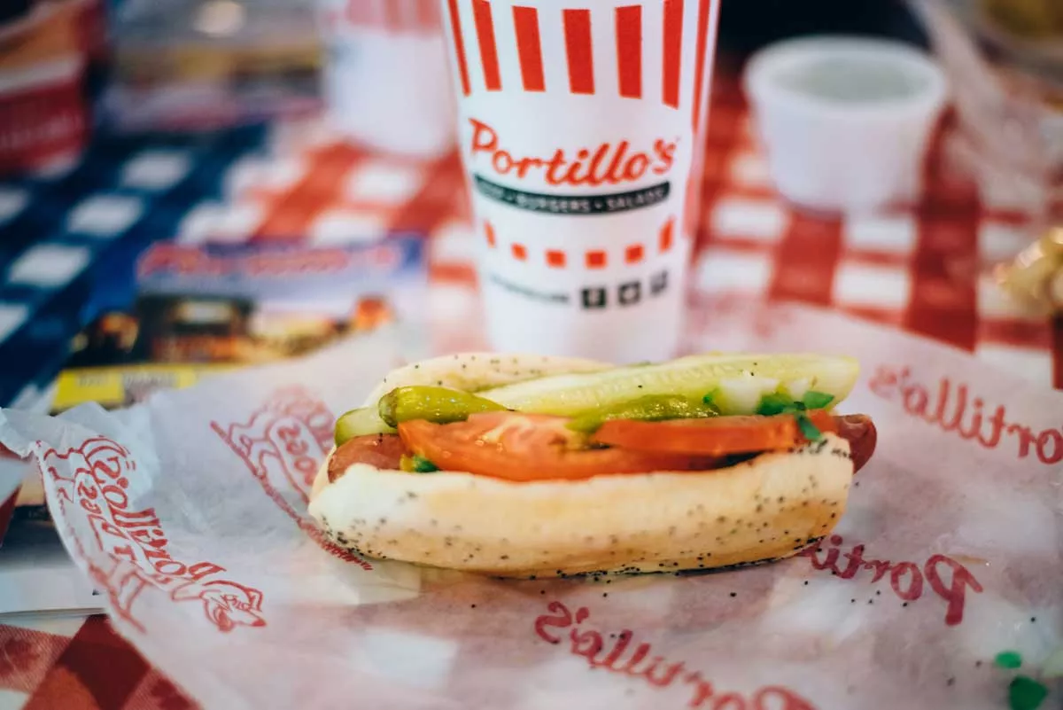 Image: A “dragged through the garden” Chicago-style hot dog from Portillo’s.