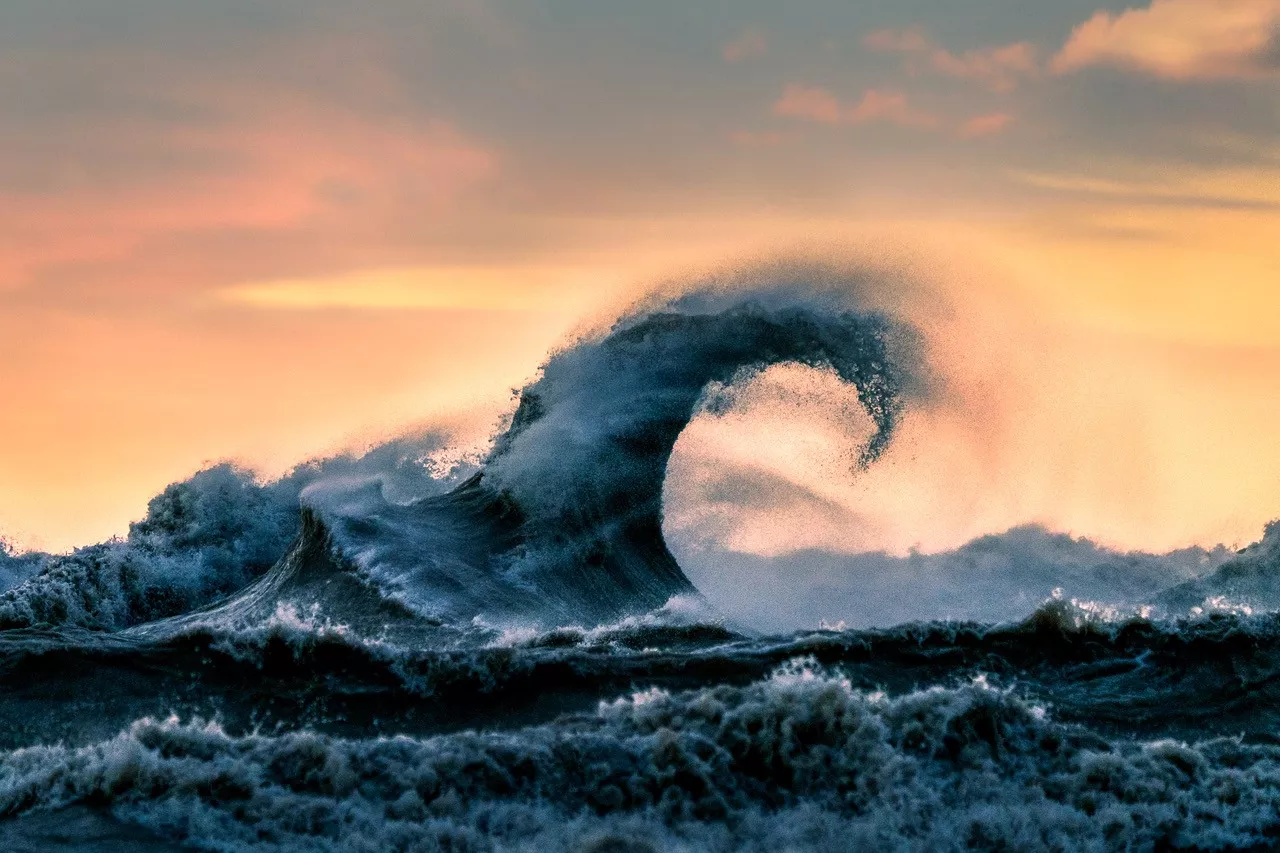 “It was during an intense wind storm in the fall of 2014 that I first witnessed the powerful waves Lake Erie can generate. Lake Erie is the shallowest and the warmest of the five Great Lakes. And the waves I capture on this lake are generally two-fold. There are the main lake waves, which are generated from strong winds that whip up the water, and there are secondary waves that are created when these waves crash into barriers near the shoreline.”