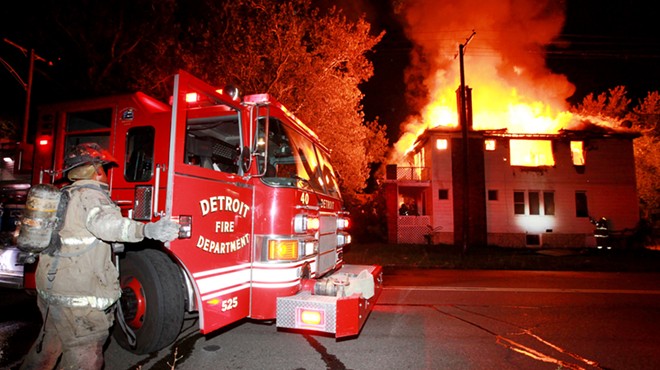 A Detroit firefighter battles a blaze.