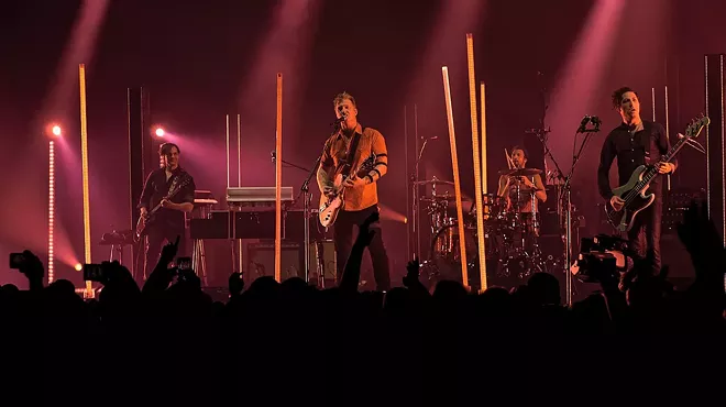 From left: Detroit’s Dean Fertita and Josh Homme of Queens of the Stone Age.