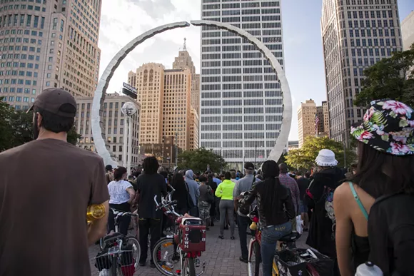 National Moment of Silence vigil held for Michael Brown in Detroit's Hart Plaza on Aug. 18, 2014. - Courtesy of Jenneatte Fleury