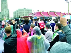 Rallying outside a Detroit McDonald’s, protesters demand a living wage.