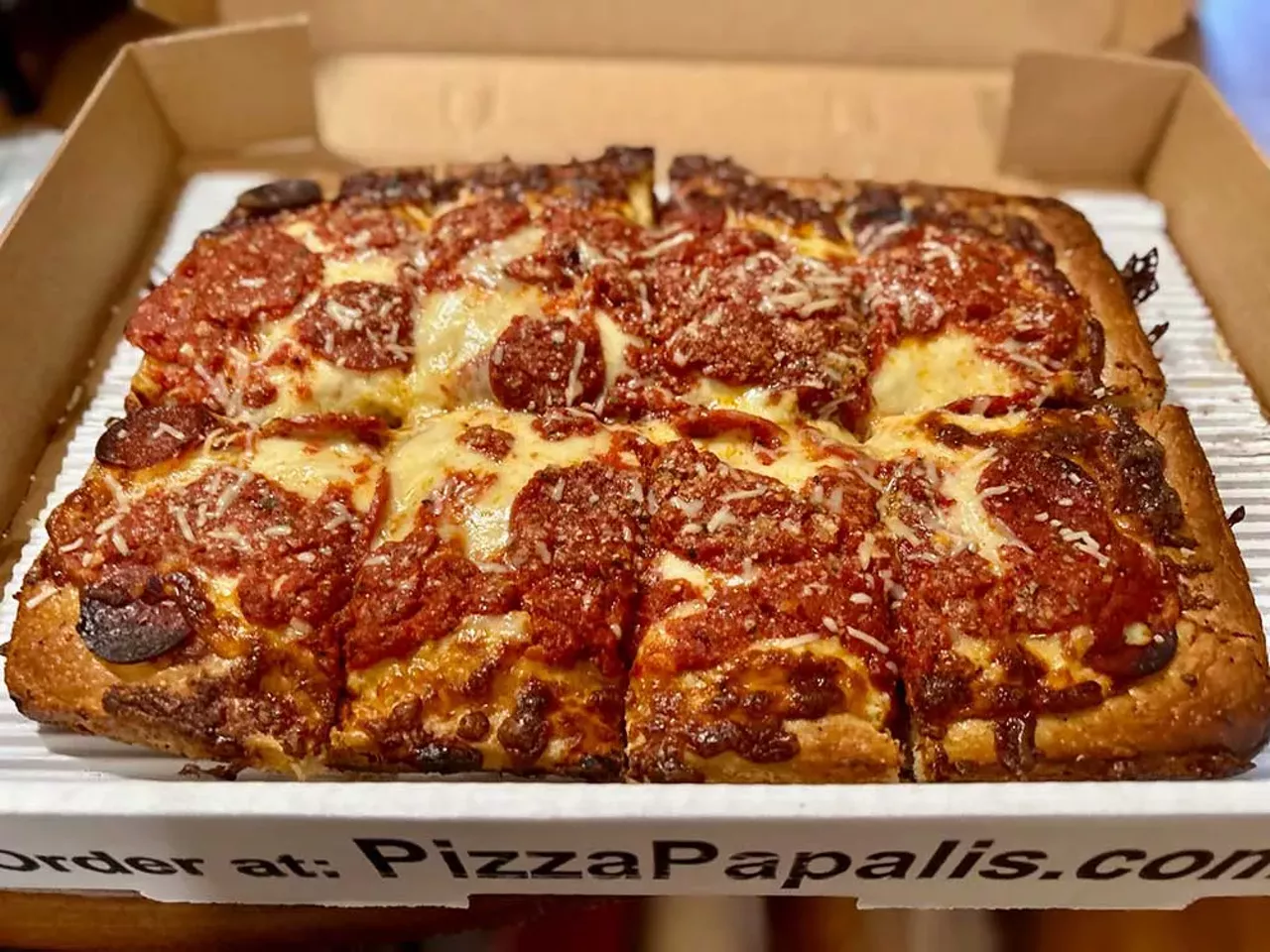 #21 PizzaPapalis Multiple locations; pizzapapalis.com Known for its Chicago-style deep dish, PizzaPapalis introduced its take on Detroit-style pizza in 2020. It comes in one size, with eight large slices. Their version sticks to the basics — a thick, rectangular pie with a crispy-edged crust and a classic cheese-and-sauce layering. The dough is surprisingly airy for a deep-dish style, giving each bit a nice contrast between the soft interior and the caramelized edges. The flavor of the cheese and sauce is solid, but the portions are light, leaving some bites feeling dry.