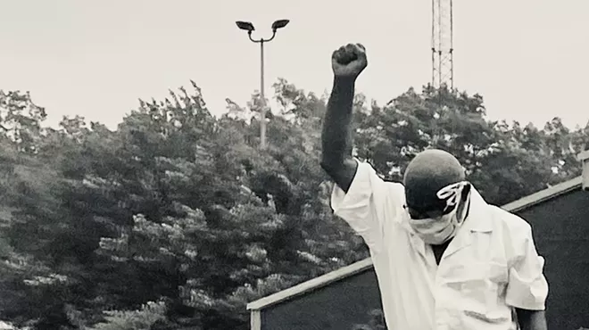 Ray Gray walks out of a state prison in Muskegon after 48 years behind bars, Tuesday, May 25, 2021.