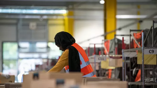 Image: Reps. Tlaib and Dingell confronted by police before finding 'unsafe conditions' at Amazon warehouse in Romulus