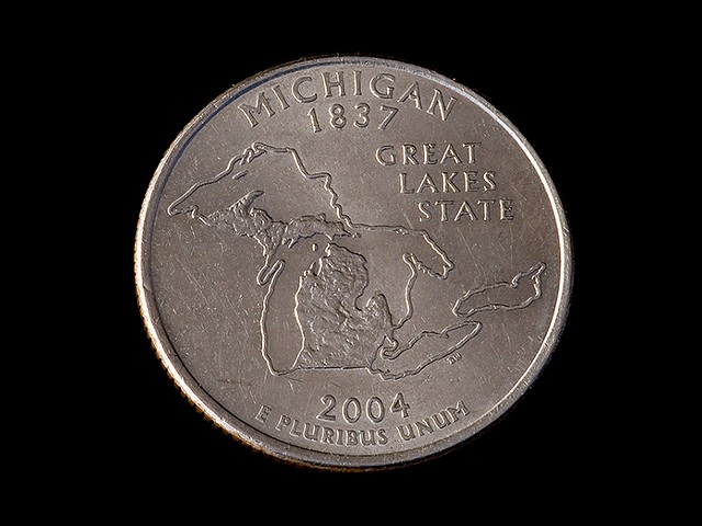 A quarter emblazoned with an image of Michigan.