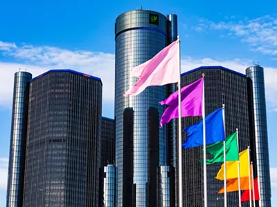 Rainbow flags fly in front of the Detroit’s GM Renaissance Center during Pride Month.