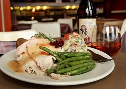 Roasted turkey dinner with smashed potatoes and fresh green beans from Mudgie’s Deli in Detroit.