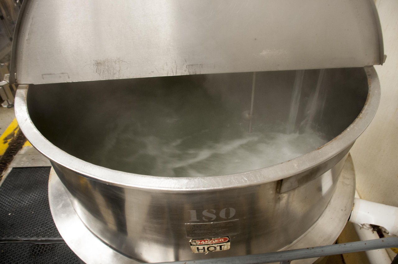 Simultaneously, 300 gallons of brine is heated in a vat to kill off anything potentially harmful.