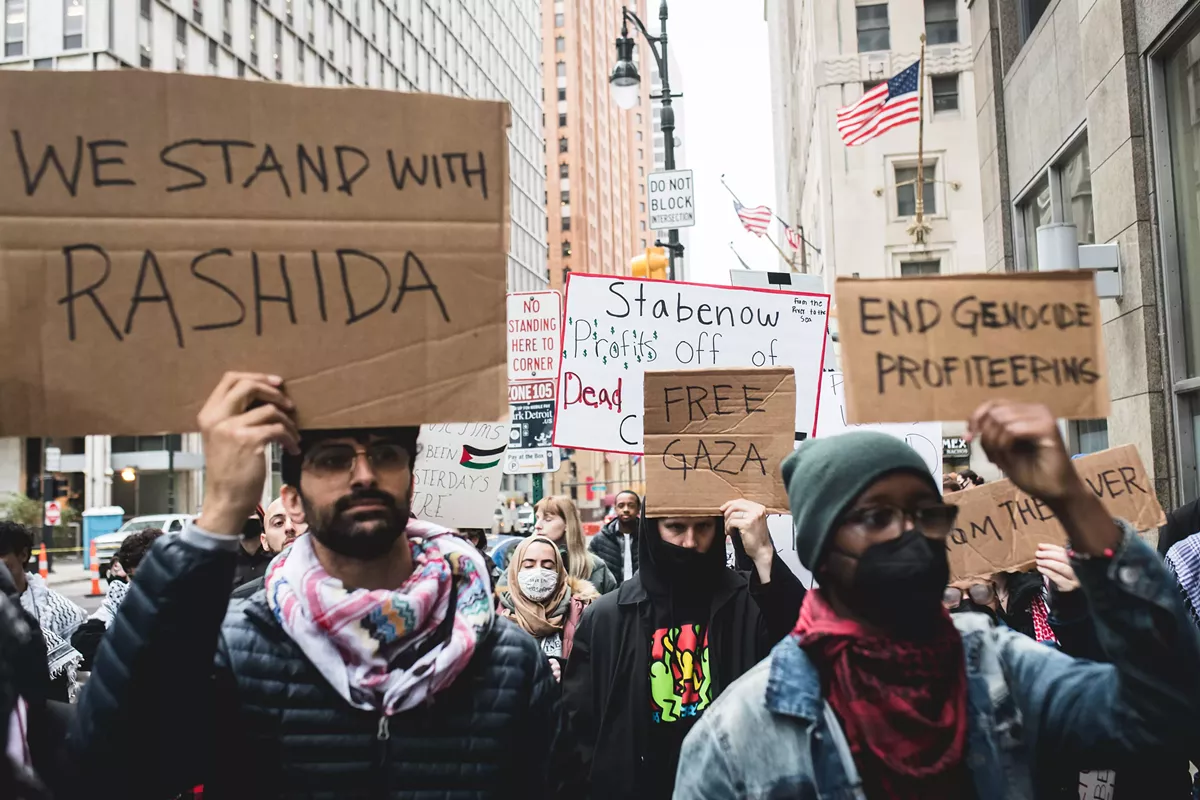 Over a hundred people gathered in Detroit on Thursday to protest outside of Debbie Stabenow's office.