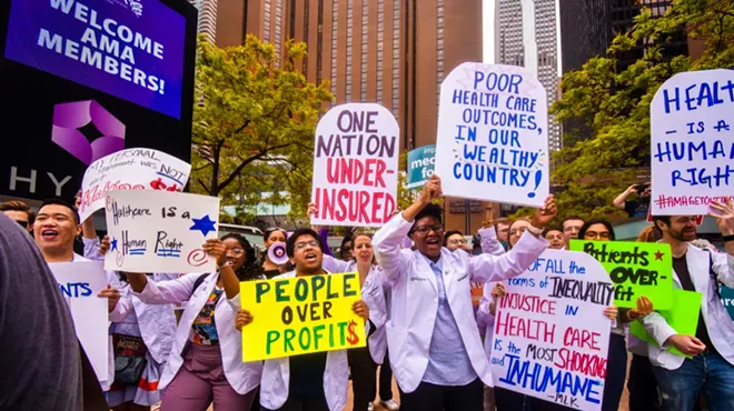 A large group of people gather for the first-ever Medicare For All Rally led by Bernie Sanders in downtown Chicago in 2019.