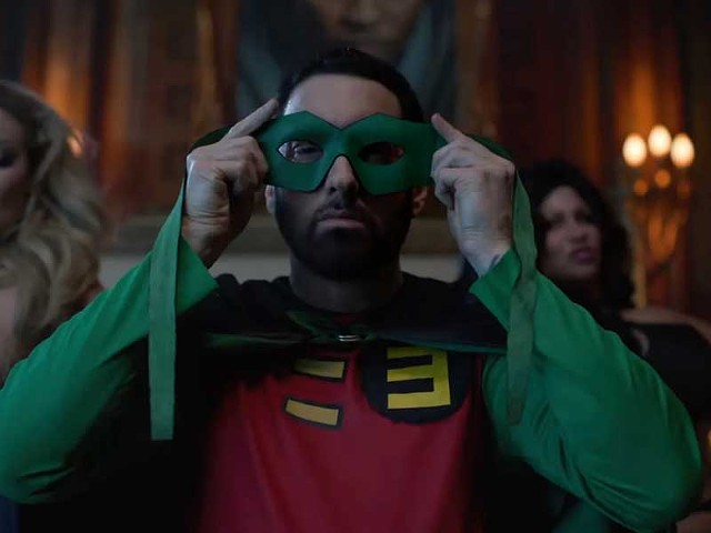 Eminem reprises his superhero role in the video for “Houdini.”