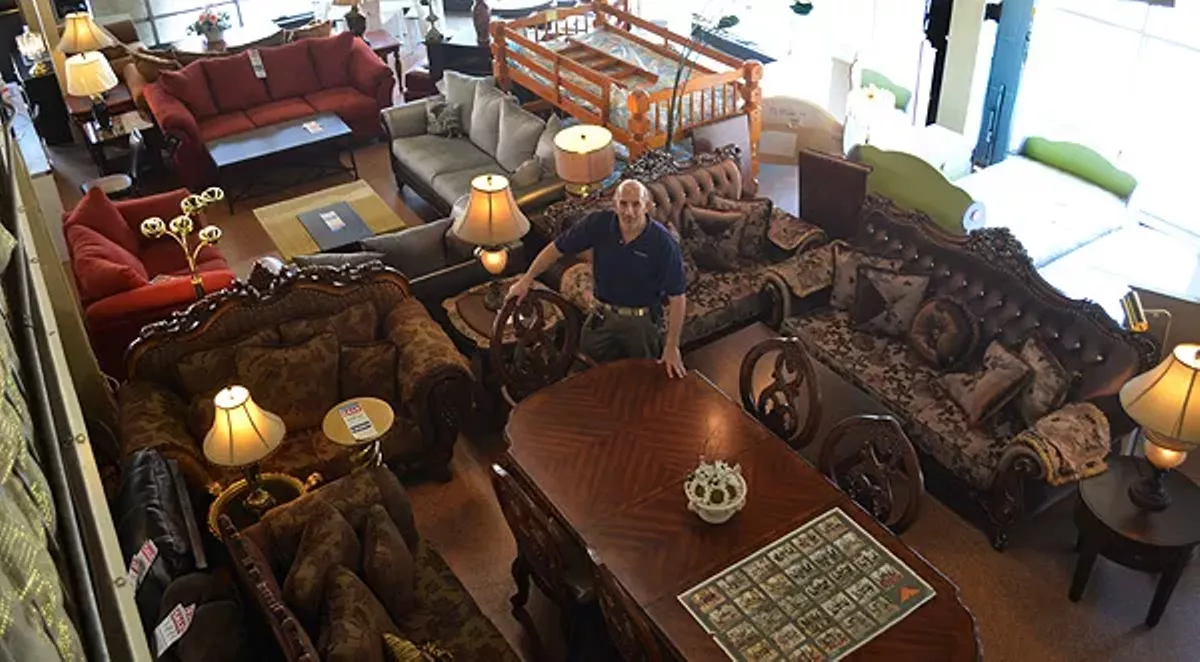 Image: Irwin Danto inside Danto Furniture’s West Vernor location.