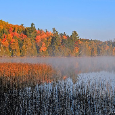 Sleeping Bear    Empire        Sleeping Bear Dunes might be popular for ATV riding in the summer, but a hike along the trails in fall offer beautiful views of the changing season.    