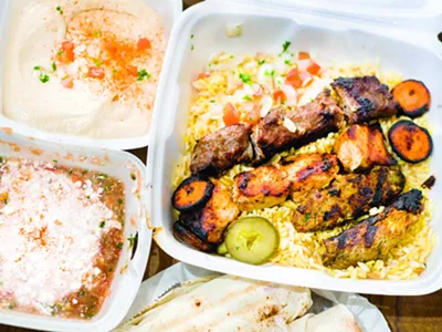 From top right, counterclockwise: Shish combo with Tahama kebab, beef shawarma and chicken tawook; hummus; sahawik with jubn; Tahama kebab sandwich.