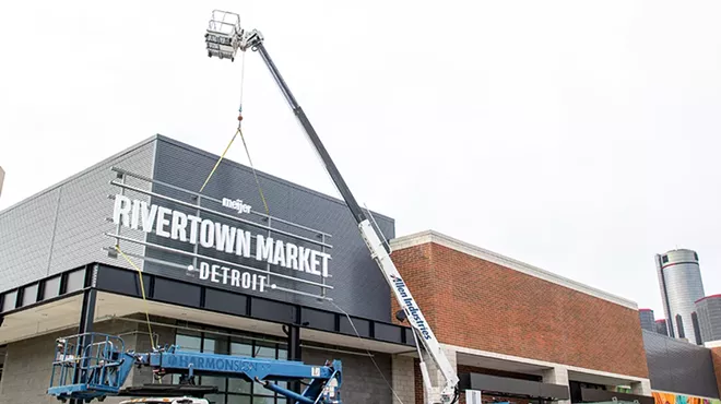 Workers are putting the finishing touches on Detroit's Meijer Rivertown Market.