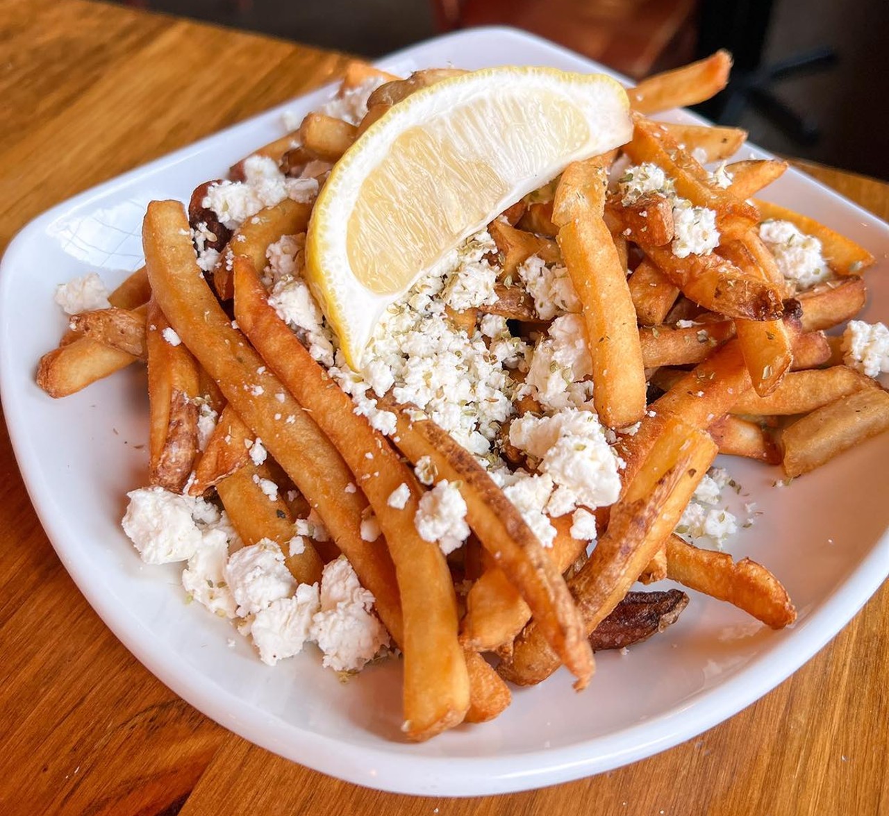 Republica 
1999 Coolidge Hwy., Berkley; 248-268-3175; republicaberkley.com
This gastropub in Berkley has award-winning fries that make a simple side look fancy. Dubbed “Platos Potatoes,” the fries are topped with feta cheese, lemon, and oregano for a Greek twist. 