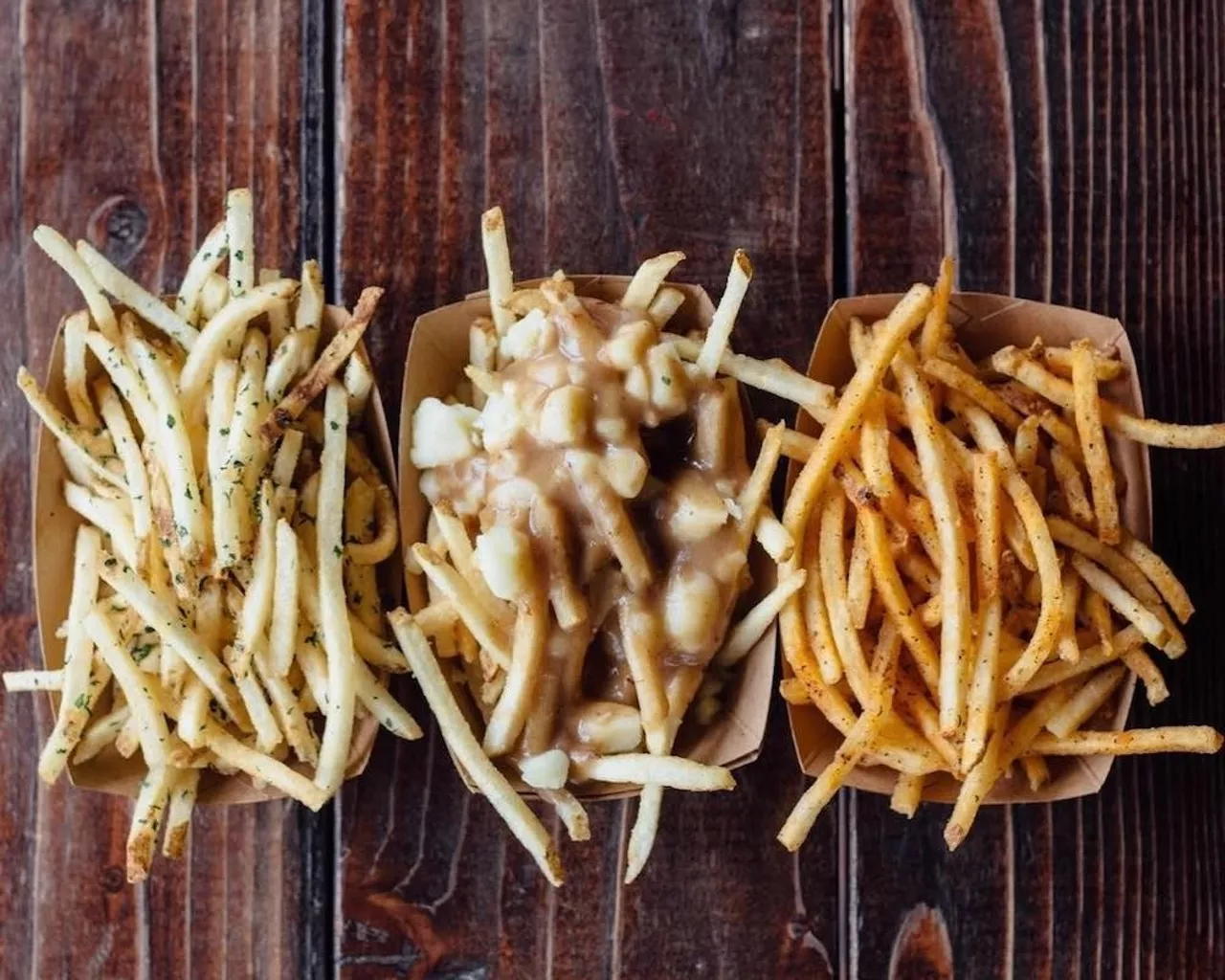 Green Dot Stables 
2200 W. Lafayette Blvd., Detroit; 313-962-5588; greendotstables.com
Sliders are the name of the game at Green Dot Stables, but their shoestring fries pair amazingly with this spot’s signature sliders. The restaurant won Best Poutine in the Metro Times Best of Detroit reader’s poll multiple times. Plus, they’ve got great truffle fries too, and all options are affordable. 