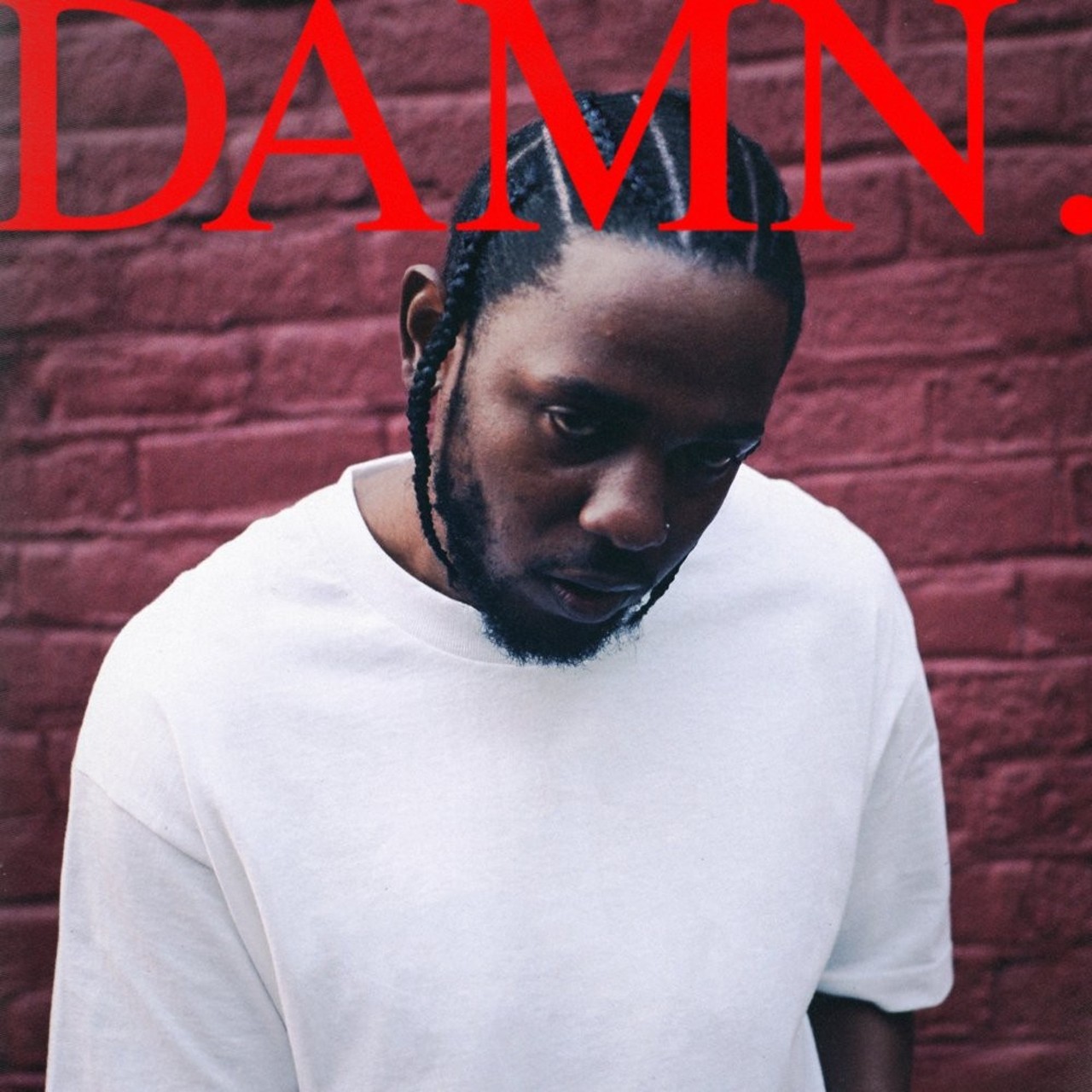 2. Kendrick Lamar | DAMN.
From the corner store to the gates of heaven, both sin and salvation clash within a tormented Kendrick Lamar on DAMN. A balance of sentimentality and self-examination, DAMN. might not be as groove-driven as his last effort, 2015's To Pimp a Butterfly, but Lamar's unmatched lyrical stamina is on full display here.
The underlying introspection on DAMN. is far more complex and emotive than the hype that comes with being a Kendrick Lamar record, too &#151; the record is as hype as it is socially relevant and politically charged.
Listen to: The entire album backward. Seriously.
Use this lyric on your next Instagram post for the haters: "I feel like debating on who the greatest can stop it/ I am legend, I feel like all of y'all is peasants/ I feel like all of y'all is desperate/ I feel like all it take is a second to feel like/ Mike Jordan whenever holdin' a real mic/ I ain't feelin' your presence/ Feel like I'ma learn you a lesson."