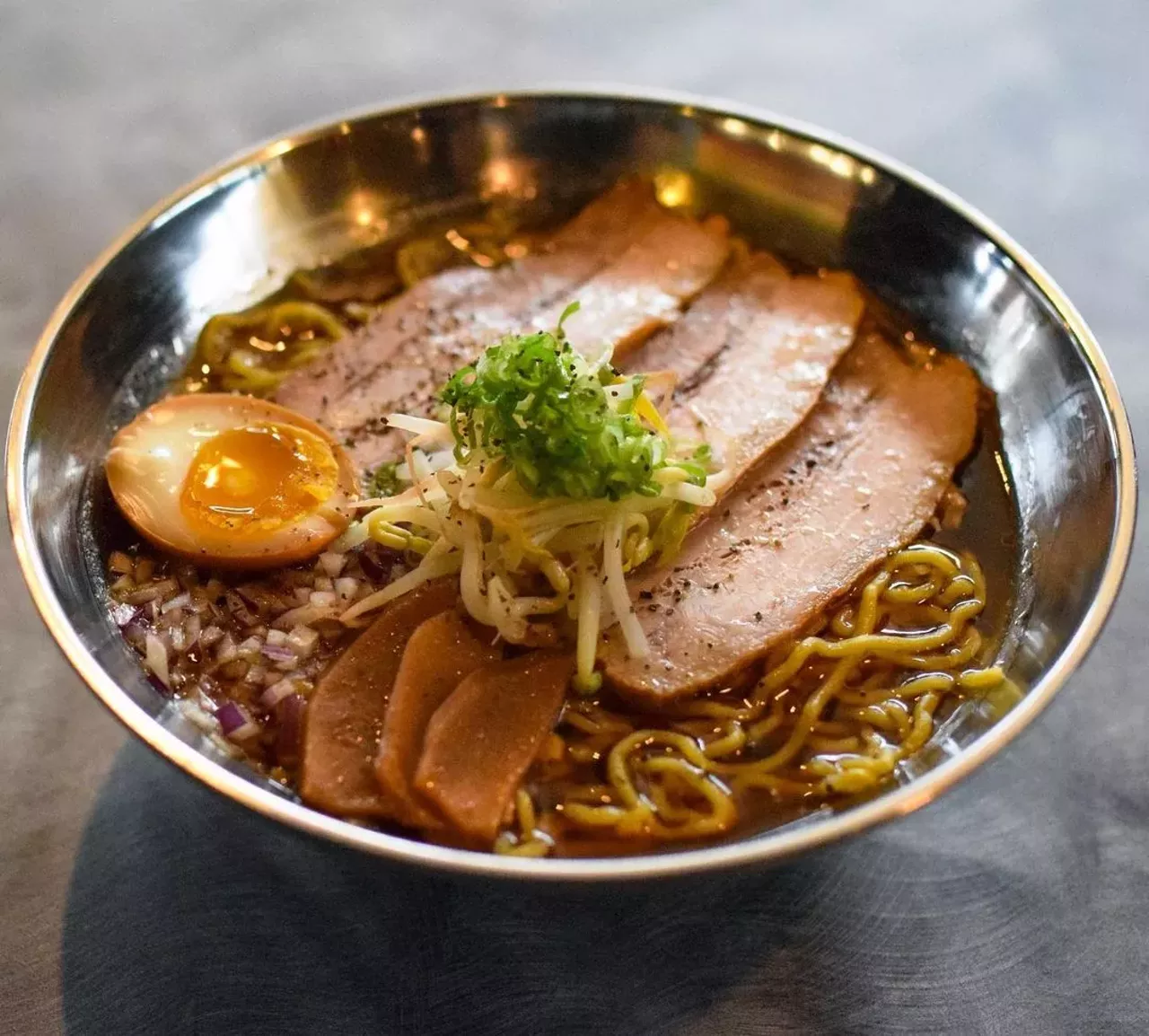 Black Tonkotsu at Shiromaru5365 Crooks Rd., Troy; 248-792-6015; shiromarutroy.com Pork bones are roasted and then simmered for many hours to produce the rich and creamy broth (not literally creamy; think pork fat) that embraces the slippery house-made ramen. The chef swirls in aged black garlic, some wood ear mushrooms, green onions, half a marinated egg, and best of all, pork belly chashu, braised till it’s chopstick-tender. The various mouth-feels alone — slidey noodles, velvety soup — would be enough to make this dish a star, but the lush flavors take it to the mountaintop. Classic (plainer) tonkotsu and Red, with spicy chili garlic sauce, are also on hand. (Read our full review.) —Jane Slaughter