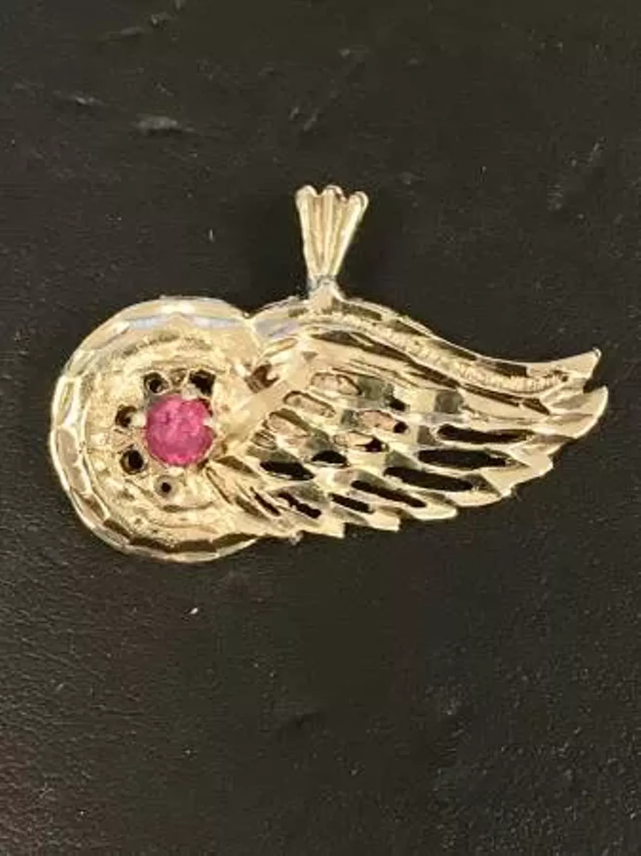 Gold Red Wing Charm ($80) Sportin&#146; the Wings in some 10K gold is the final touch to any game-day fit. Photo via Hassan / Craigslist