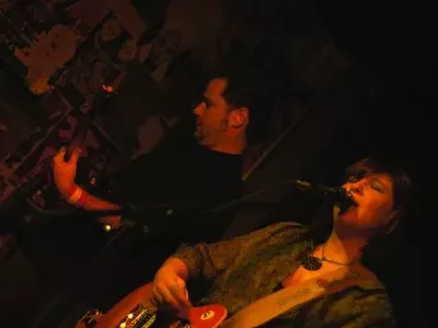 Bassist Mike Shellabarger (left) and country crooner Carrie Shepard (right) of the Whiskey Charmers.