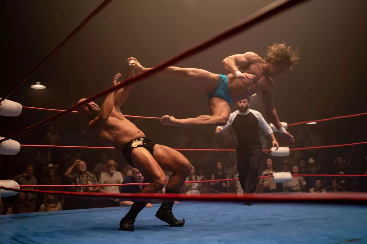 Image: Yes, that’s Zac Efron flying high, and his acting is as impressive as his physique.