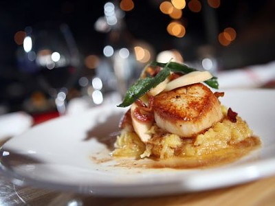Sautéed sea scallops with spaghetti squash, smoked apples, bacon, brown butter and sage, from the Meeting House in Rochester.