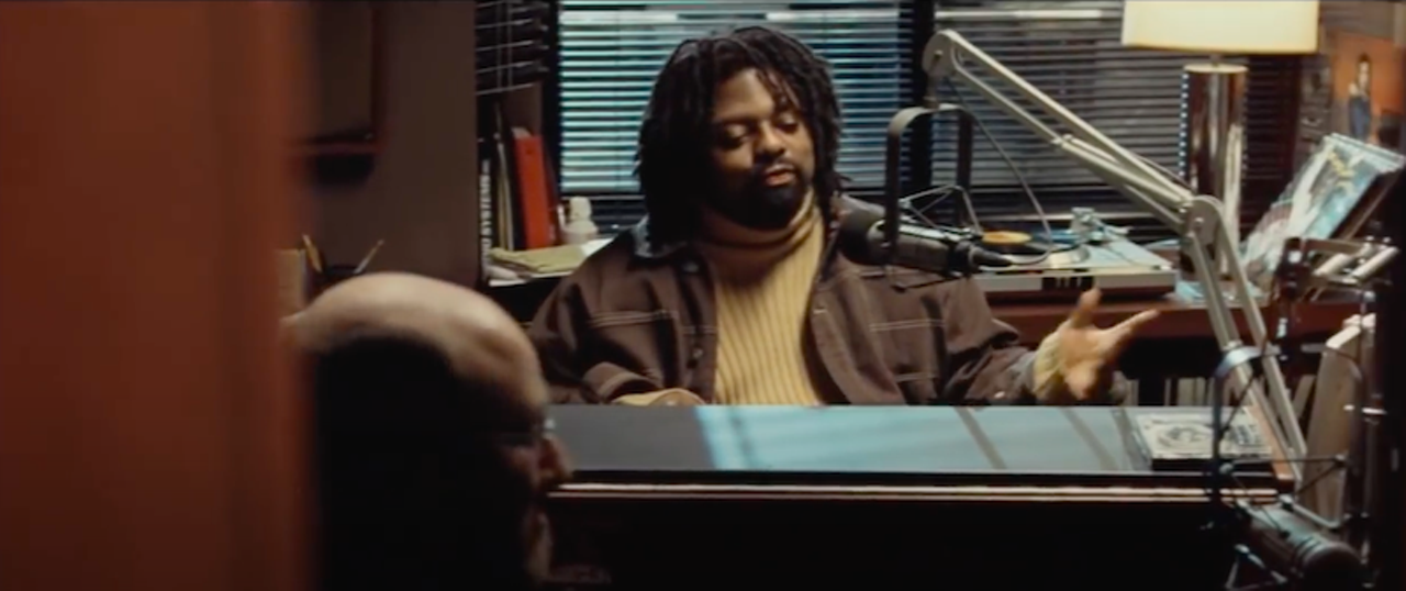 In the film: WJLB Disc Jockey
Rabbit heads to the Penobscot Building to meet Wink, who promised he’d connect him with a manager at the radio station WJLB. IN the scene, we see the rapper Big O (aka King Gordy in real life) being interviewed by WJLB DJ Bushman.