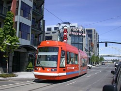 The Portland Streetcar, with a route of 7.35 miles, has 70 stops. The proposed M1 transit line connecting downtown to Midtown and New Center could employ a similar concept.