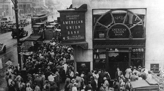 Crowd at New York’s American Union Bank during a bank run early in the Great Depression.