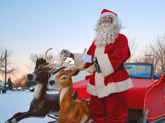 Santa Benford with his reindeer-led Dodge Caravan sleigh.