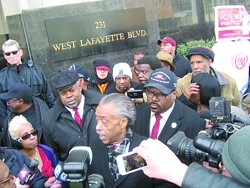 The Rev. Al Sharpton and other activists announce the filing of a federal lawsuit challenging the constitutionality of Michigan’s Emergency Manager Law.