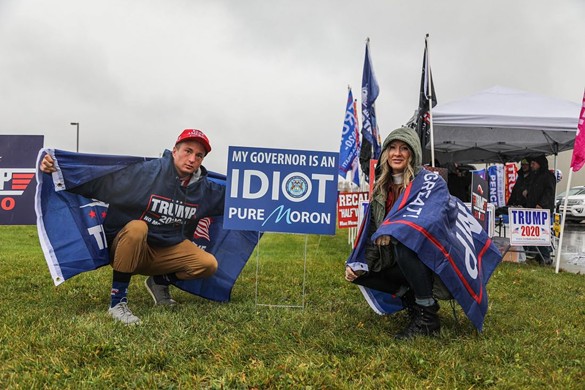 These Trump supporters waited in the rain to go to a rally in Lansing during a pandemic