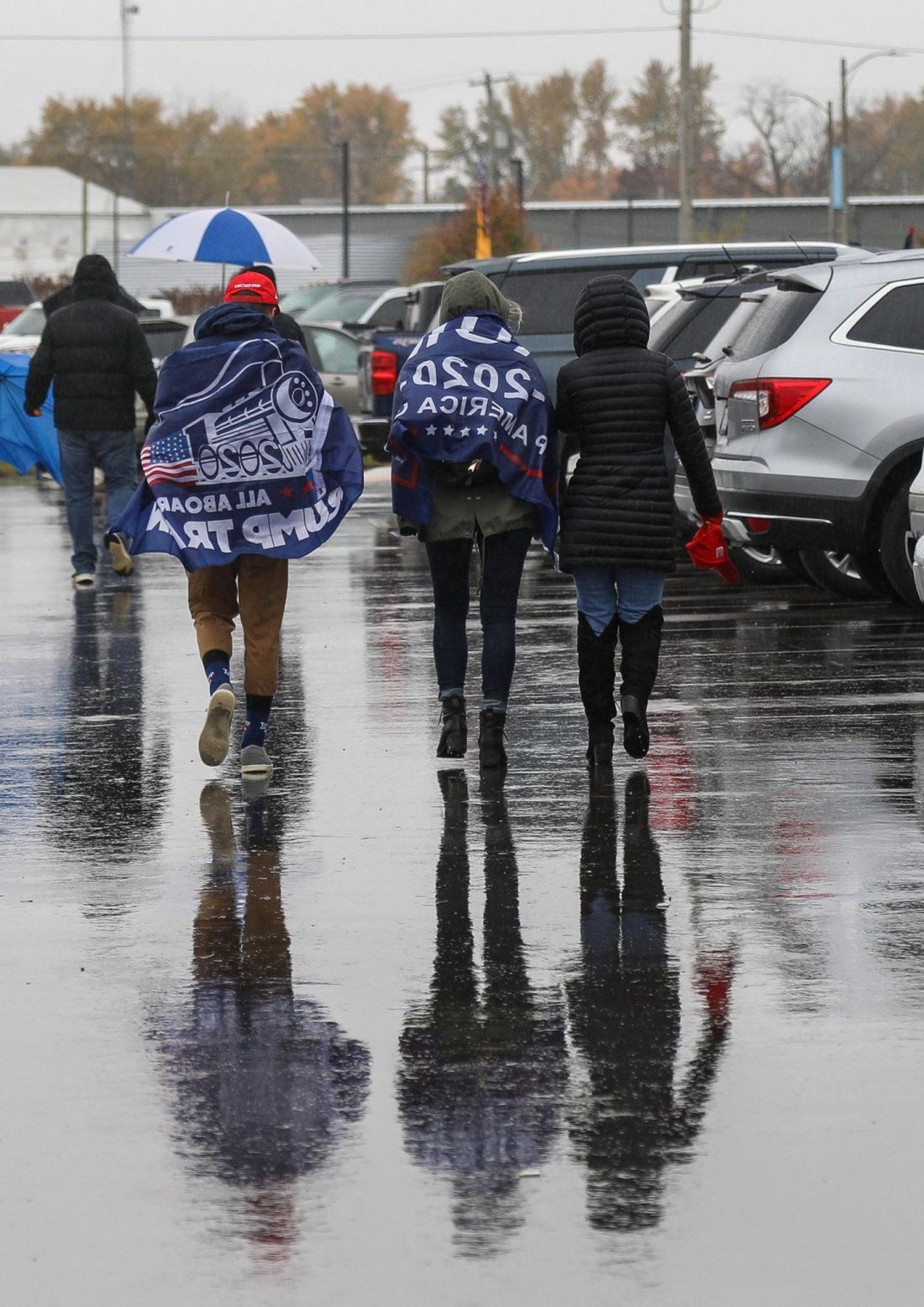 These Trump supporters waited in the rain to go to a rally in Lansing during a pandemic