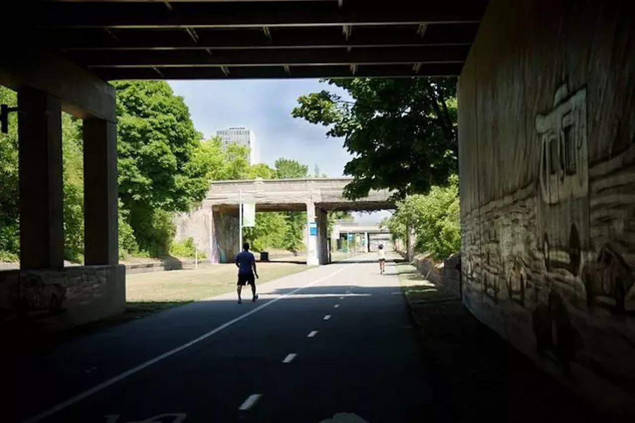 Ride the Dequindre Cut 1776 Woodbridge St., Detroit; detroitriverfront.org/riverfront/dequindre-cut Cut it out, would ya? We&#146;re trying to get our breeze on. The Dequindre Cut Greenway is a dope two-mile greenway connecting the East Detroit Riverfront, Eastern Market, and some residential areas. The below-street level pedestrian greenway is prime for biking and has bike lanes, as well as street art, murals, and provides a moment of zen in the hustle-bustle of the city. You can also rent a bike via Detroit Wheelhouse, but appointments are required. Photo via Hannah Ervin/Detroit Stock City