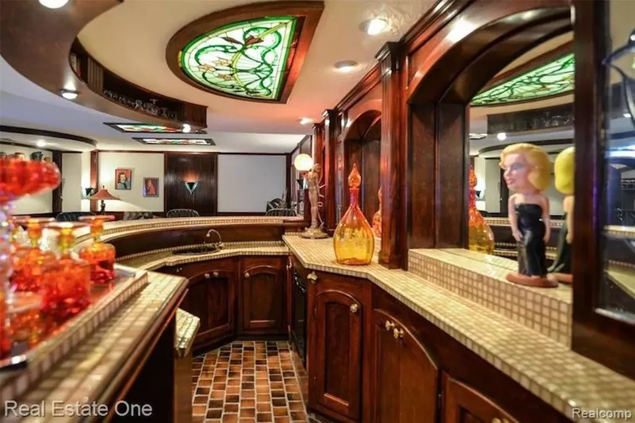 Image: This $1.6 million eclectic Milford mansion has koi ponds, pergolas, and apple trees &#151;&nbsp;let's take a tour