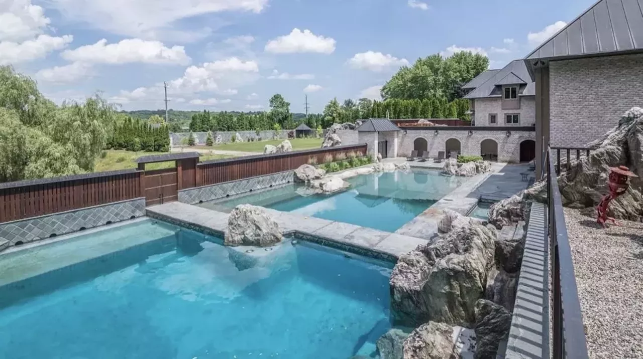 Image: This $1.79 million Ann Arbor mansion has a lagoon fit for a tiger king or queen &#151; let's take a look