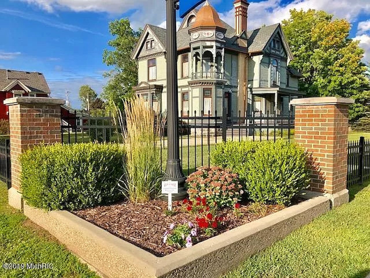 This 1885 Queen Anne House for sale was built by former Michigan Secretary of State Daniel Striker
