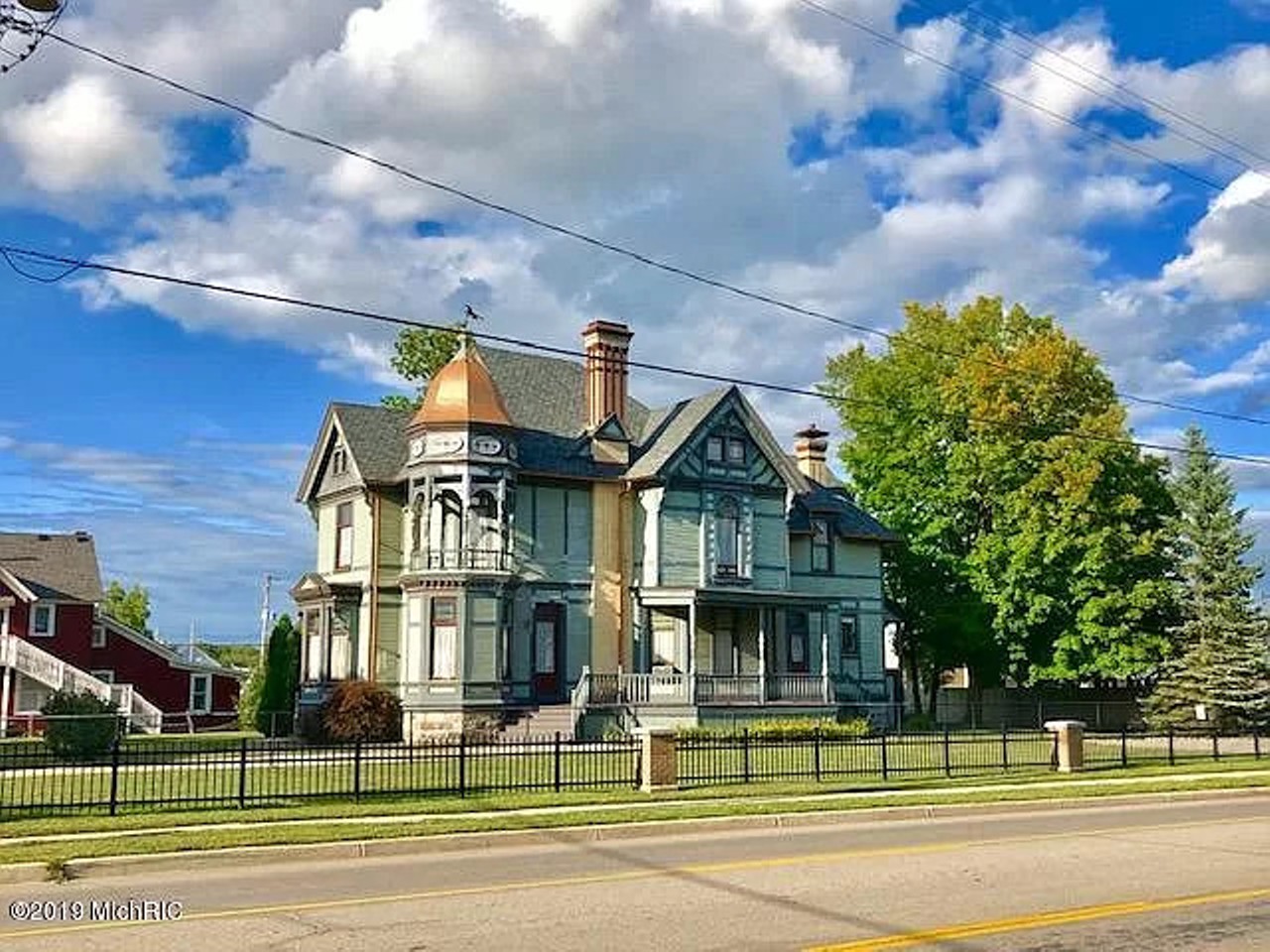 This 1885 Queen Anne House for sale was built by former Michigan Secretary of State Daniel Striker